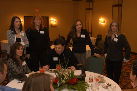 Members of the class of ‘94 celebrated their 10-year reunion by sharing memories of college days.  - Photo by Jim Veneman