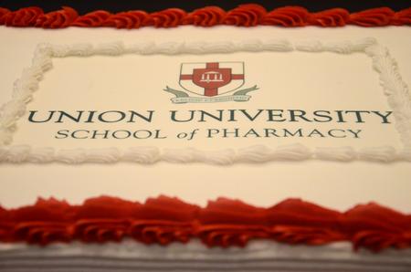 New pharmacy students enjoy refreshments at the White Coat Ceremony reception in the Grant Events Center. - Photo by Meg Rushing