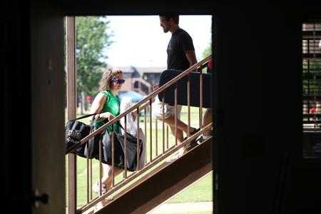 Upperclassmen help new students move into their new rooms on move-in day. - Photo by Kristi McMurry Woody