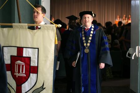 Dub Oliver, president of the university, recesses out of Fall Convocation behind Will Duncan, senior class president. - Photo by Kristi McMurry Woody
