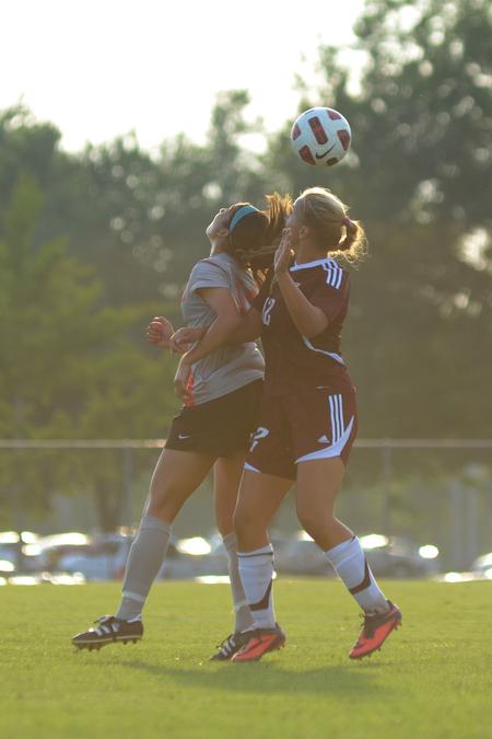Lady Bulldog, Honeye Heydari, junior, fights for the ball against a Freed Hardeman Lady Lion opponent during an exhibition game. - Photo by MiKalla Cotton