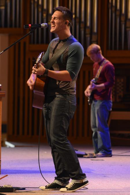 Union alum Brett Perkins leads music in chapel. - Photo by MiKalla Cotton
