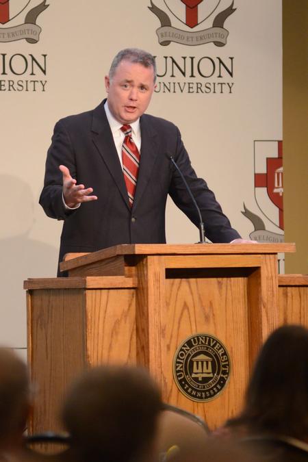 Todd Brady, vice president of university ministries, welcomes West Tennessee pastors and their wives to the appreciation banquet held in the Carl Grant Events Center. - Photo by Emily Stookey