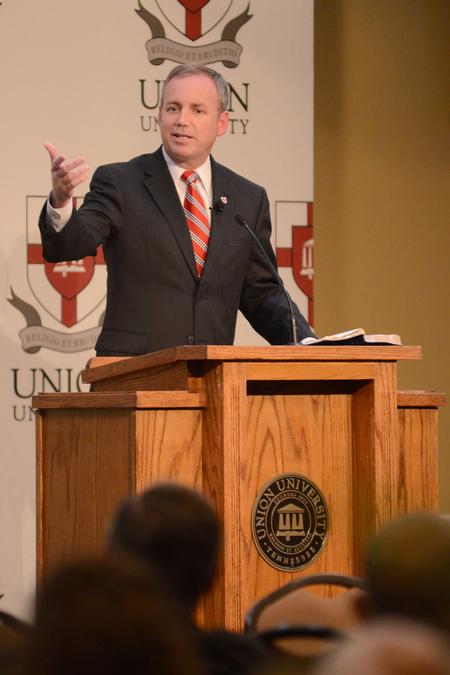 Dub Oliver speaks about his new position as Union's 16th President and extends gratitude to the West Tennessee pastors and wives at the banquet held in the Carl Grant Events Center. - Photo by Emily Stookey