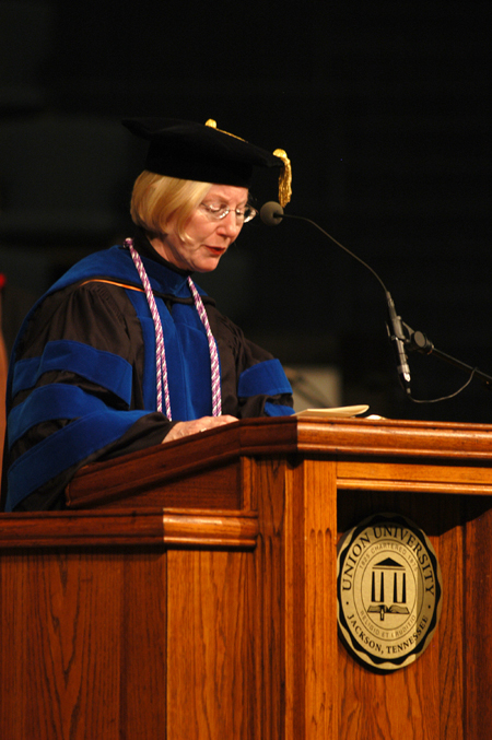 Donna Sachse, associate professor of nursing and chair of the School of Nursing on Union’s Germantown campus, gave the closing prayer at Summer Graduation 2004. - Photo by Morris Abernathy