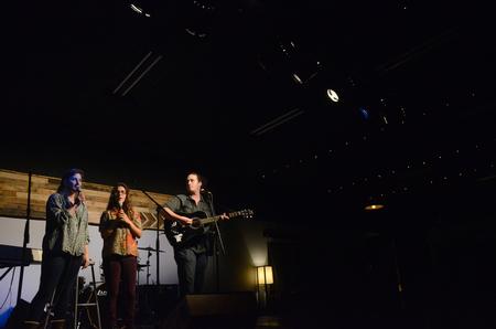Gina Nestico, sophomore undeclared, Paula Nestico, sophomore music major, and Reed McClean, sophomore music major, perform "Call Your Girlfriend" by Robyn for Open Mic night in Barefoots Joe.  - Photo by Emily Stookey