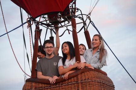 Union students ride in a hot air balloon during Union Night, a part of Family Weekend.  - Photo by Emily Stookey