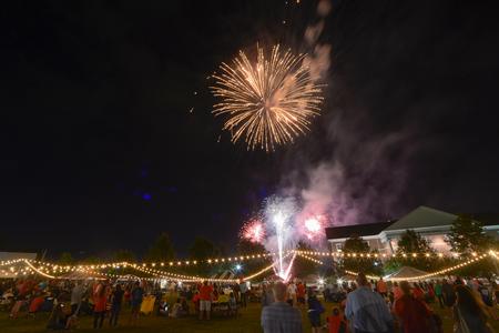 Students, families, employees and friends of the university gaze at the fireworks display over campus at the conclusion of Union Night.  - Photo by Morris Abernathy