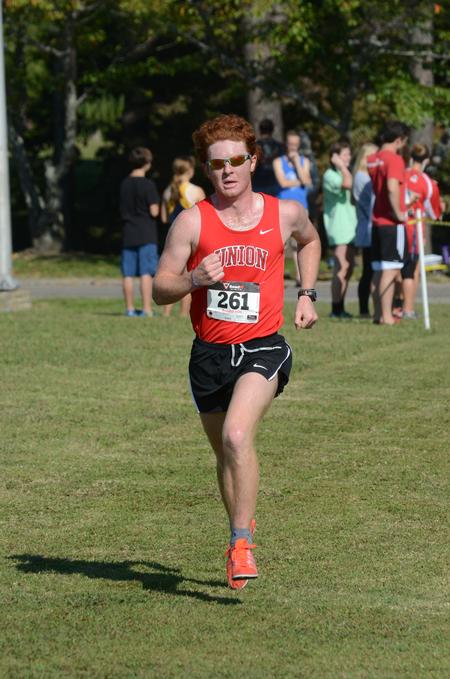 Bailey Bell, junior business administration major, runs in a cross country meet on Union University's campus. - Photo by Meg Rushing
