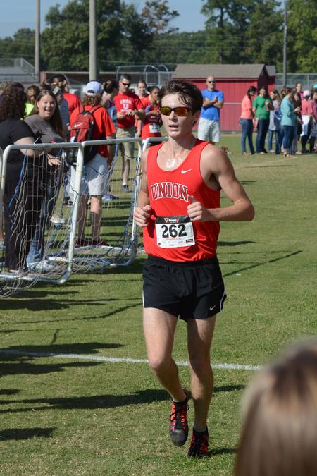 Will Donelson, sophomore chemistry major, finishes first in a cross country meet on Union University's campus. - Photo by Meg Rushing