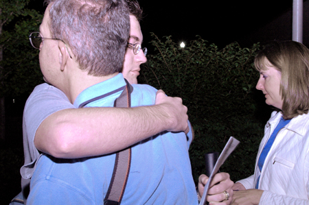 Freshman David Kartzinel of Melbourne, Fla. says good bye to his parents after the FOCUS worship service on Saturday evening. - Photo by Lindsay Stavish