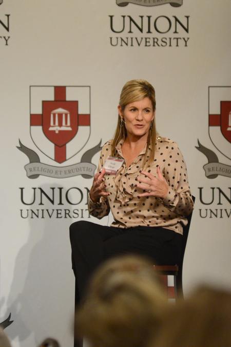 Susie Oliver, first lady of the university, answers audience questions at the Union Auxiliary Fall Luncheon held in the Carl Grant Events Center. - Photo by Meg Rushing