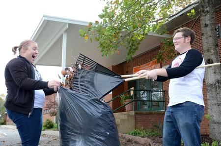 Chelsea Loomis, junior spanish and TESL double major, and Trey Gerrell, junior Christian thought and tradition major, serve at East Elementary School for Campus and Community Day. - Photo by MiKalla Cotton