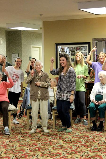 Members of Chi Omega visit Regency Retirement Village and participate in Zumba during Campus and Community Day. - Photo by Meg Rushing