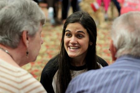 Katy Wade, senior zoology major, talks with Regency Retirement Village residents on Campus and Community Day. - Photo by Meg Rushing
