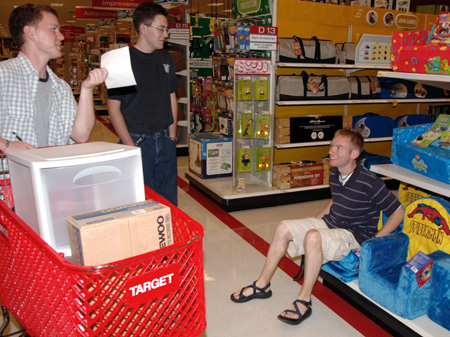 (left to right) Alvin Jeffery, David Kartzinel and Brian Burns take time to do a little shopping after a busy day of moving in. - Photo by Lindsay Stavish