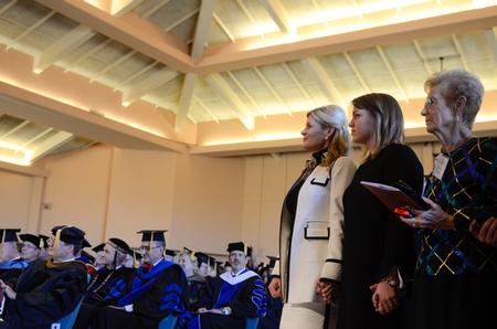 Wilma Oliver, right, mother of president Dub Oliver, holds hands with first daughter Callie and first lady Susie Oliver during the 16th presidential inauguration ceremony at the G.M. Memorial Savage Chapel. - Photo by Kathleen Murray