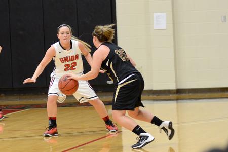 Lady bulldog Amy Philamlee, senior sports medicine major, plays defense against the ladies of Robert Morris University during the Homecoming game. - Photo by Emily Stookey