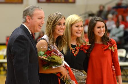 Abbey Orr, center, senior elementary education major, is crowned Homecoming Queen by Dub Oliver, Union University's 16th president, his wife, Susie, and Mel Arias, Homecoming Queen for 2013.  - Photo by Emily Stookey