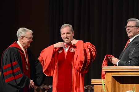 Dub Oliver, Union University's 16th president, is inaugurated into office by Hyran Barefoot, left, Union University's 14th president, and Norman Hill, right, Board of Trustees Chair. - Photo by Emily Stookey