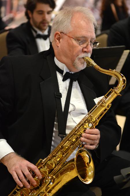 David McClune, professor of music, plays with the Union University jazz band during the reception following the 16th presidential inauguration ceremony.  - Photo by Emily Stookey