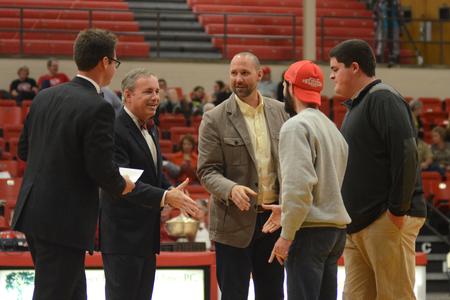 The men of Lambda Chi Alpha accept the award for third place in the President's Cup competition at the homecoming game in Fred delay Gymnasium. - Photo by Meg Rushing