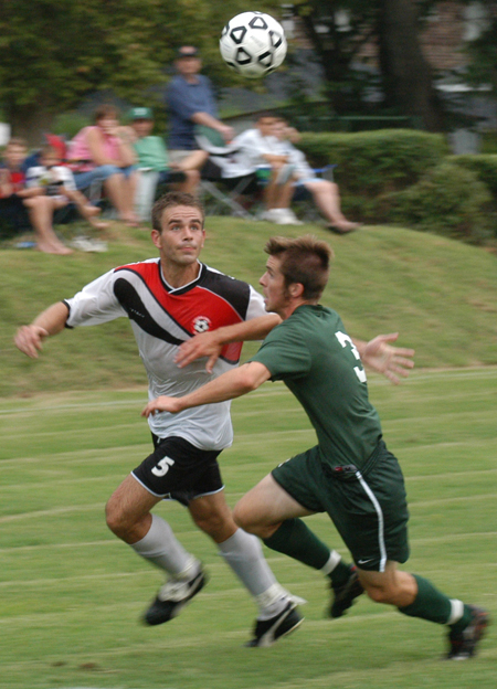 Senior captian Daniel Lee and a Belhaven (Miss.) player make a play on the ball.  - Photo by Jonathan Blair