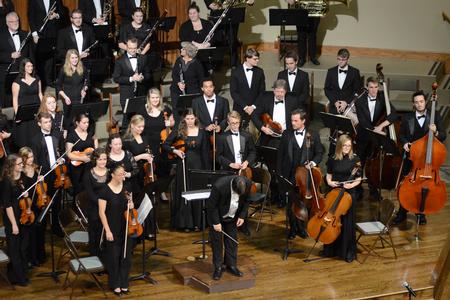 Michael Mann, assistant professor of music, bows in conclusion of the orchestra concert at First Baptist Church in Jackson, Tenn. - Photo by MiKalla Cotton