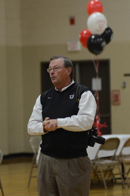 Tommy Sadler, director of athletics, welcomes alumni athletes to a homecoming NCAA reception. - Photo by Meg Rushing