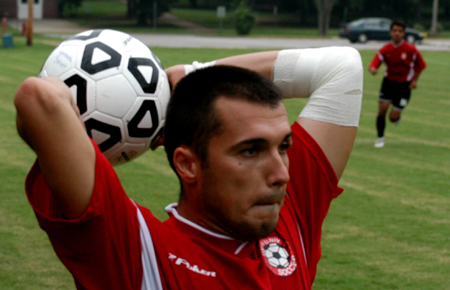 Redzi Stojiljkovic (4) prepares a throw in. - Photo by Jonathan Blair