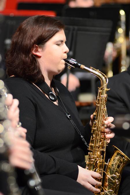 Alto saxophone player, Giggi DeCoursey, sophomore music educatin major, performs at Union University's Symphonic Band concert at First Baptist Jackson. - Photo by Emily Stookey