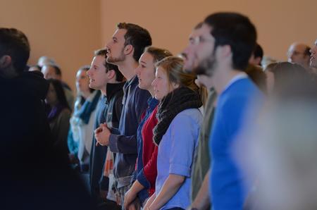 Union students sing as Cody Curtis and the university band lead worship during chapel on Preview Day. - Photo by Emily Stookey