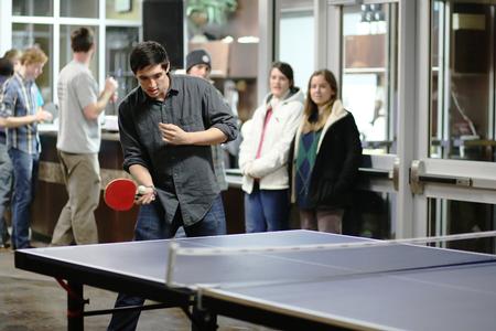 Riley Pope, junior DMS major, participates in a ping pong tournament hosted by Residence Life in the Bowld Student Commons over J-term. - Photo by Kristi McMurry Woody