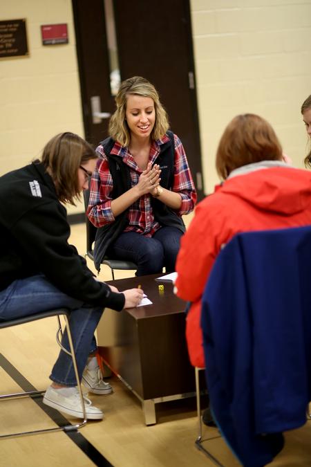 Bridgette Wilson (left), sophomore biology major, and Kaylene Portell, junior social work major, participate in a Bunko tournament hosted by Residence Life during j-term. - Photo by Kristi McMurry Woody