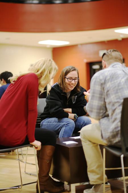 Brigette Wilson, sophomore biology major, laughs with friends during the res-life sponsored Bunko tournament in the Bowld Student Commons. - Photo by Kristi McMurry Woody