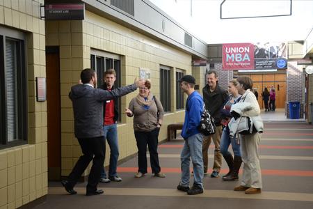 David Taylor, sophomore chemistry major, leads a tour group through the Student Union Building during Preview Day. - Photo by MiKalla Cotton