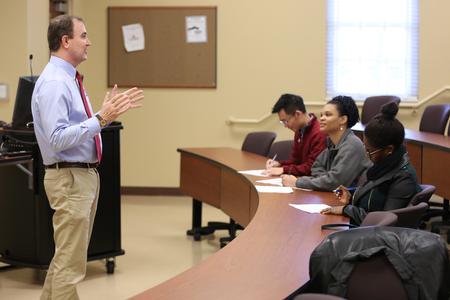 David Kuhl, Baptist Memorial Health Care Professor of Pharmacy, lectures students during the Elective in Infectious Disease course. - Photo by Kristi McMurry Woody