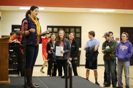 Kayla McKinney, residence director of women's quads, gives instructions for the residence life Amazing Race event held over j-term. - Photo by Kristi McMurry Woody
