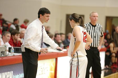 Mark Campbell, head coach, gives Kelsey Risner some instruction during a game against Valdosta State. The Lady Bulldogs won the game 77-66. - Photo by Kristi McMurry Woody