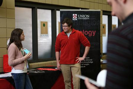 Members of the students organizations in the department of sociology stand at their table to tell students about their organization. - Photo by Kristi McMurry Woody
