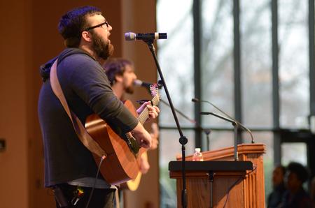Jordan Williams, senior biblical studies major, leads worship in chapel in the G.M. Savage Memorial Chapel. - Photo by MiKalla Cotton