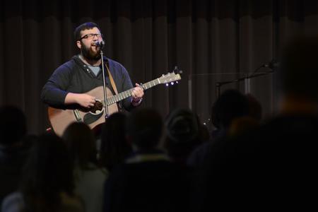Jordan Williams, senior biblical studies major, leads the congregation in a song during chapel. - Photo by MiKalla Cotton