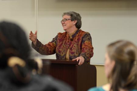 Jenny Lowery, archivist and associate professor of library services, speaks about the future of libraries at a Town and Gown event. - Photo by Meg Rushing