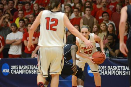 Amy Philamlee, senior sports medicine major, dribbles during the NCAA Division II Women's Basketball South Region Championship Game. - Photo by MiKalla Cotton