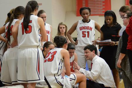 Head coach, Mark Campbell, talks to the players during a time out. - Photo by MiKalla Cotton