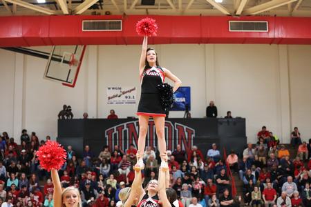 The cheerleading team leads a cheer during a game in the NCAA Division II South Region tournament quarterfinals, which the Lady Bulldogs won. - Photo by Kristi McMurry Woody