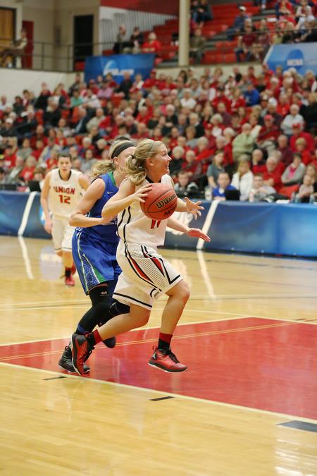 Emily Sissom drives around her opponent to the basket during the semifinal game of the NCAA Division II South Region Tournament.  - Photo by Kristi McMurry Woody