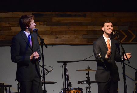 Students perform a comedy act in Barefoots Joe during Open Mic Night. - Photo by MiKalla Cotton