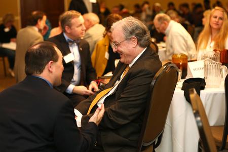 Justin Wainscott, pastor of First Baptist Church in Jackson, chats with keynote speaker Sandy Willson during the Ryan Center Bible Conference. - Photo by Kristi McMurry Woody