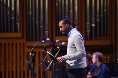 Jonathan Boyd, enrollment counselor, reads a Psalm during the Lenten Service. - Photo by Meg Rushing